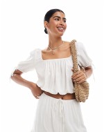 gathered crop blouse and mini skirt co ord in ivory