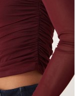 asymmetric long sve mesh top in burgundy